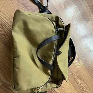 Filson Tan Duffel Bag with Black Straps